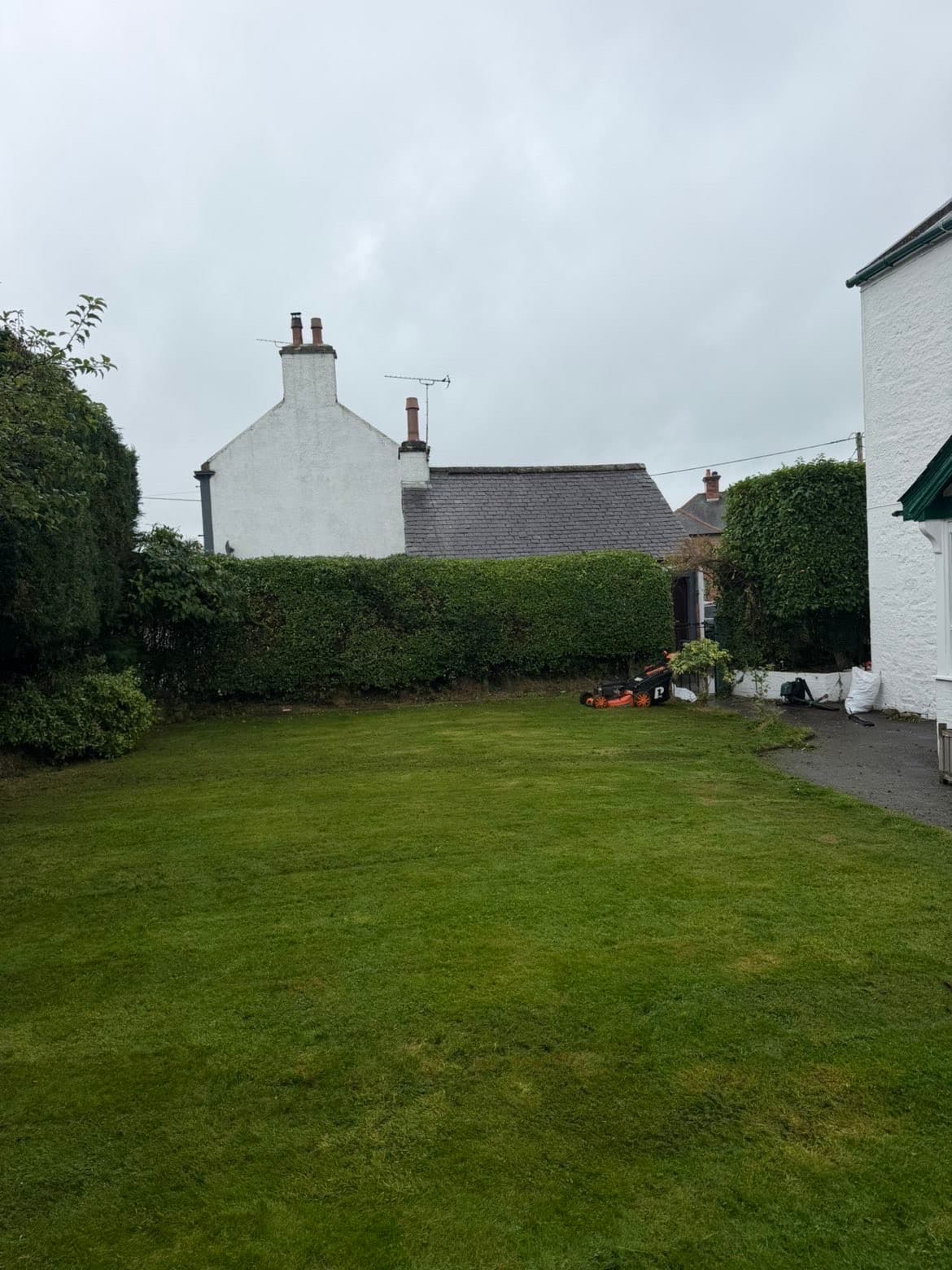 Lawn cut and hedge trimmed after garden maintenance in Lochmaben by RML Ground Maintenance