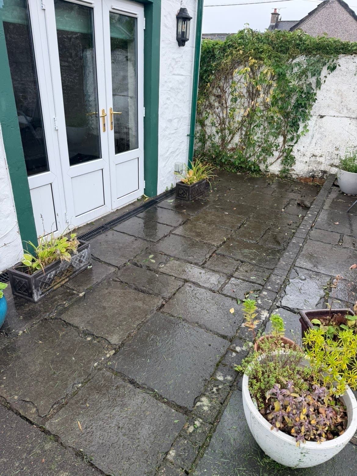 Tidied patio and planters after the garden tidy up in Lochmaben