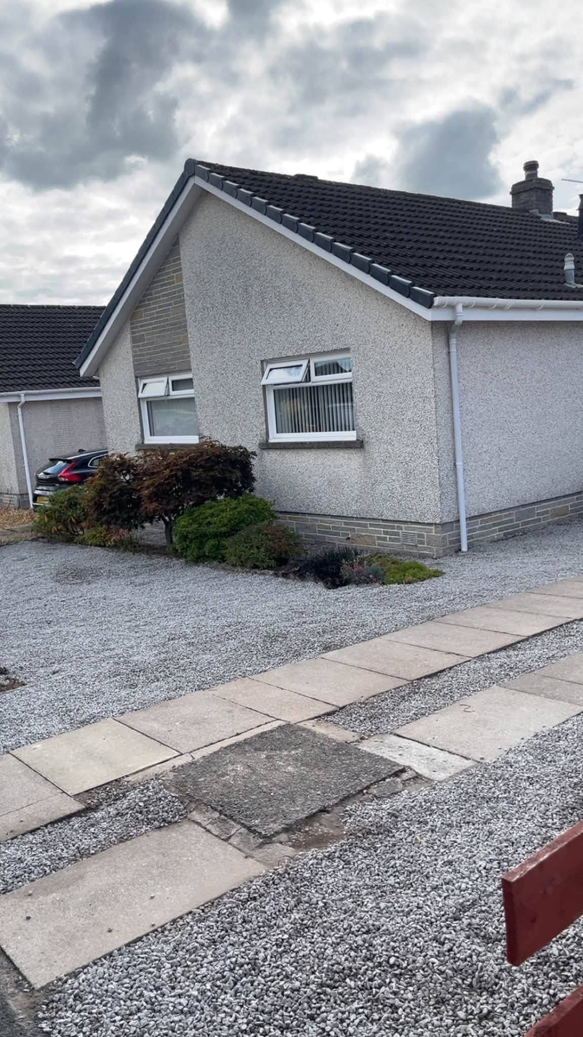 Completed garden landscaping with new gravel and tidy borders by RML Ground Maintenance in Dumfries and Galloway